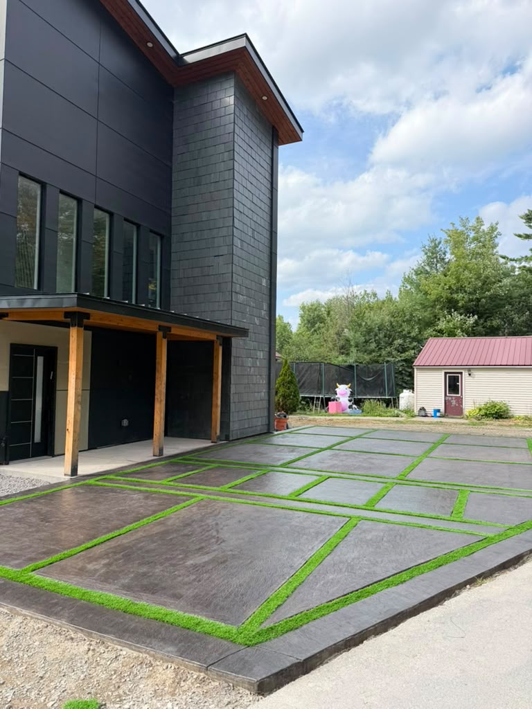 Stamped patio with green turf grid